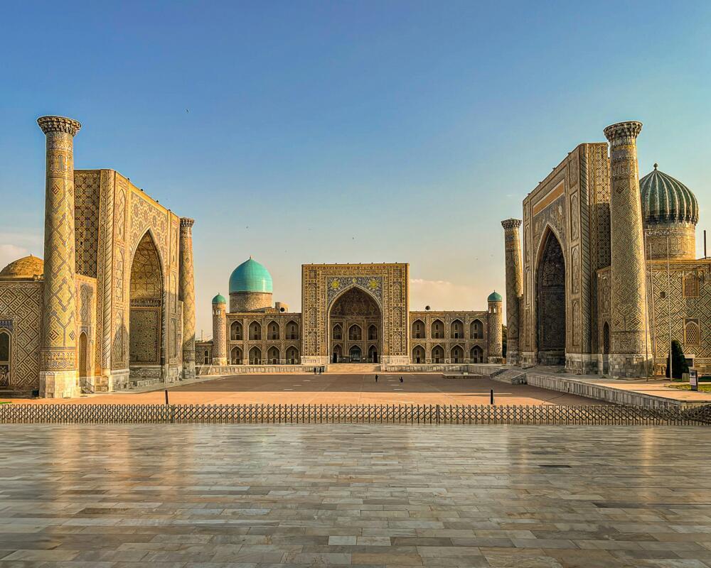A large building with a blue dome on top of it